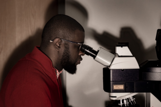 Abdus-Saboor at Microscope